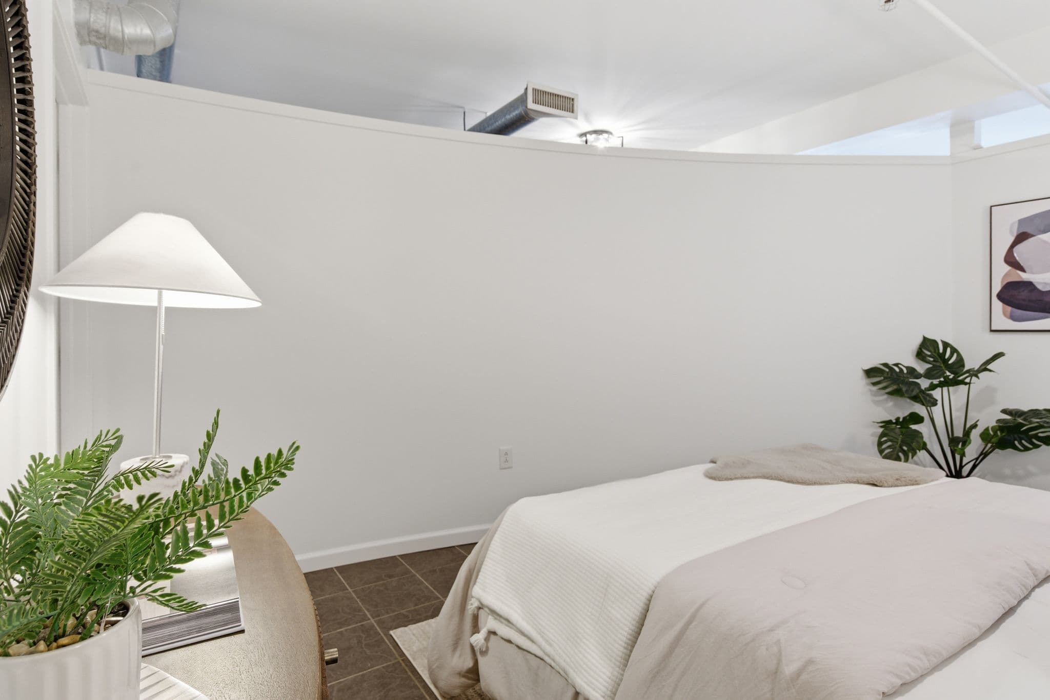 Minimal bedroom corner painted by Walsh Painting in downtown Nashville