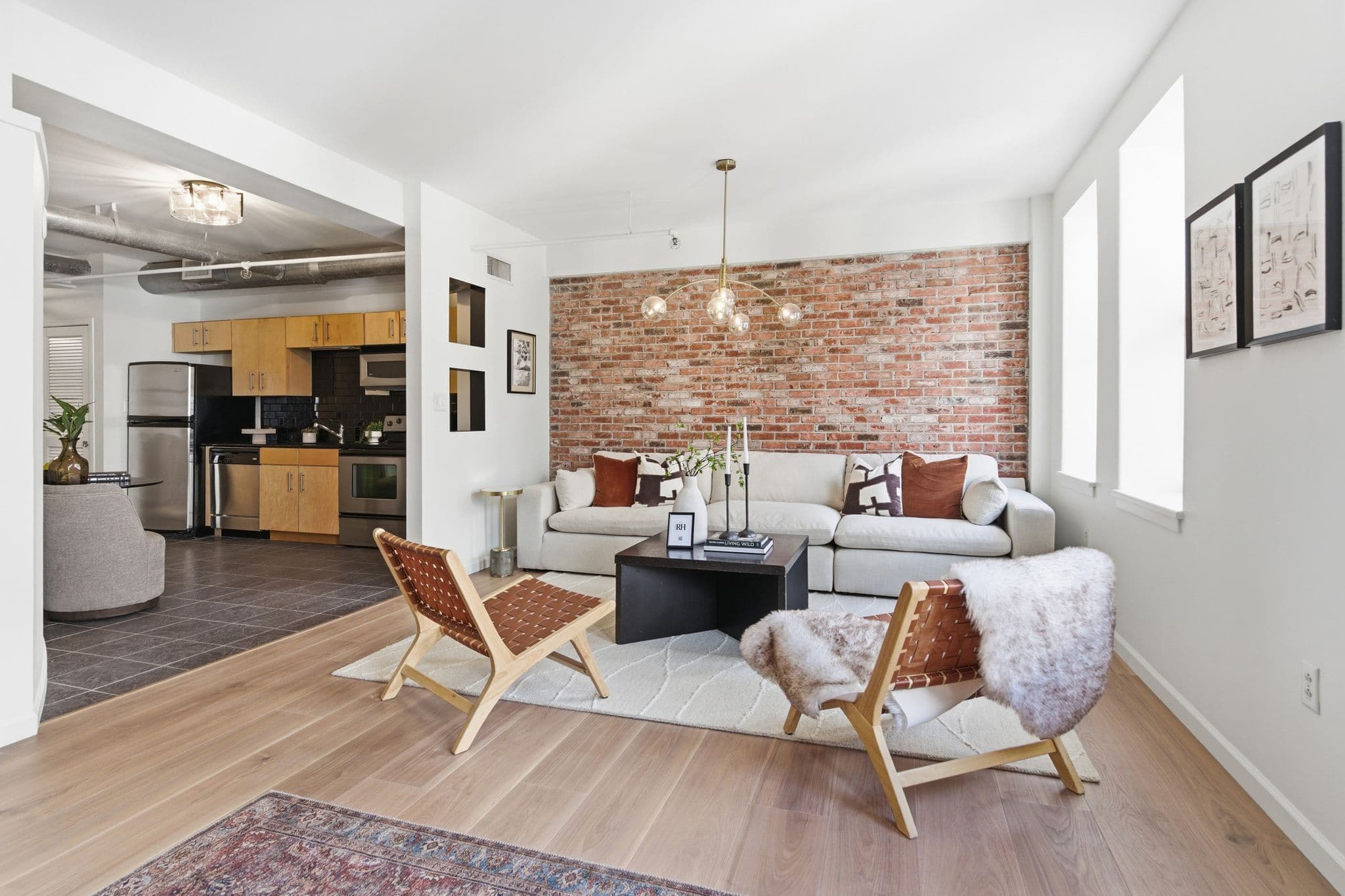 Open-concept living and kitchen with fresh interior paint in a Nashville loft