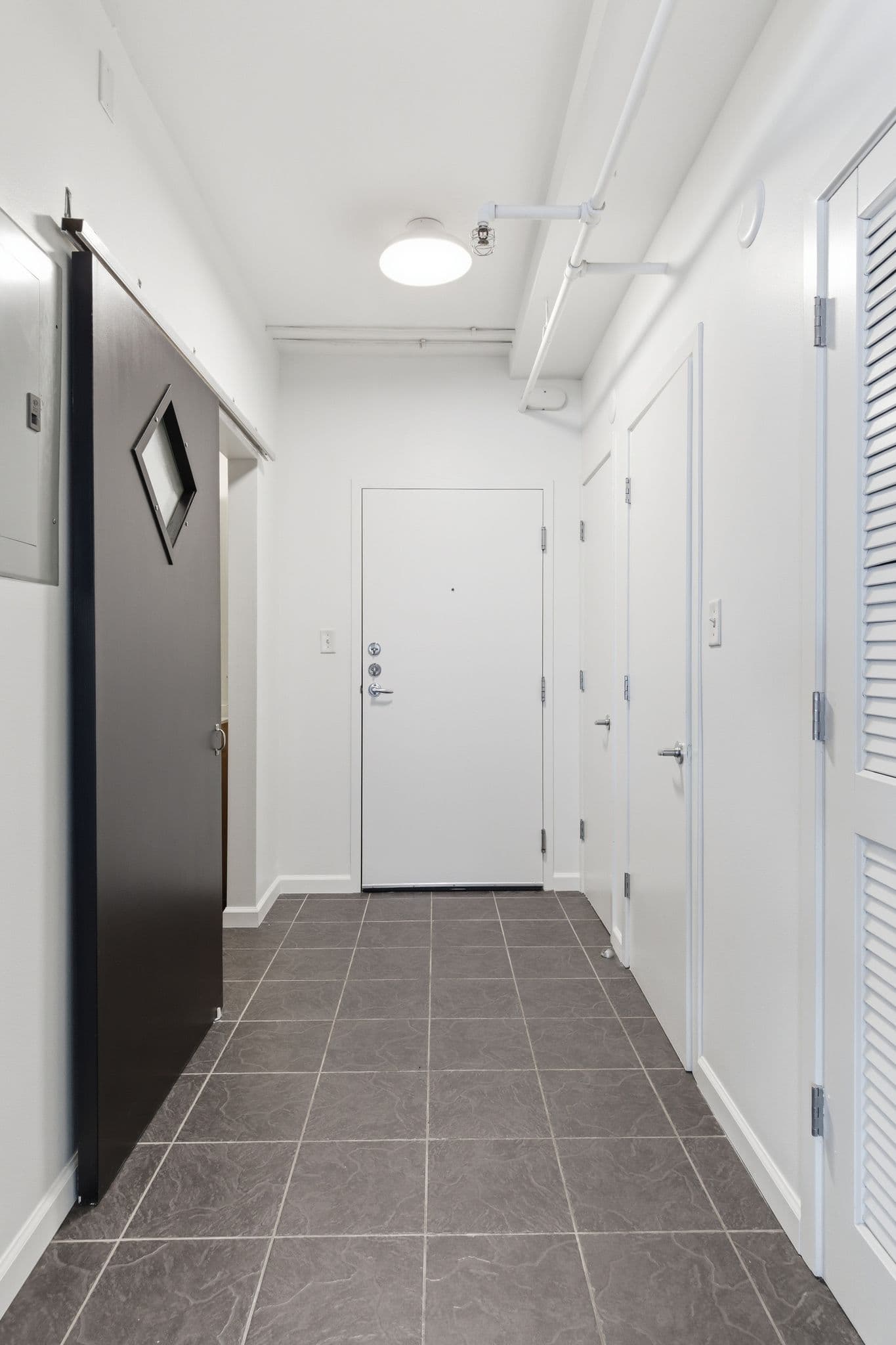 Loft entryway with painted doors and trim, Nashville